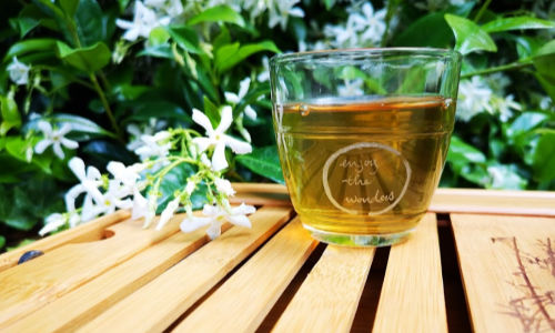 green tea in clear cup